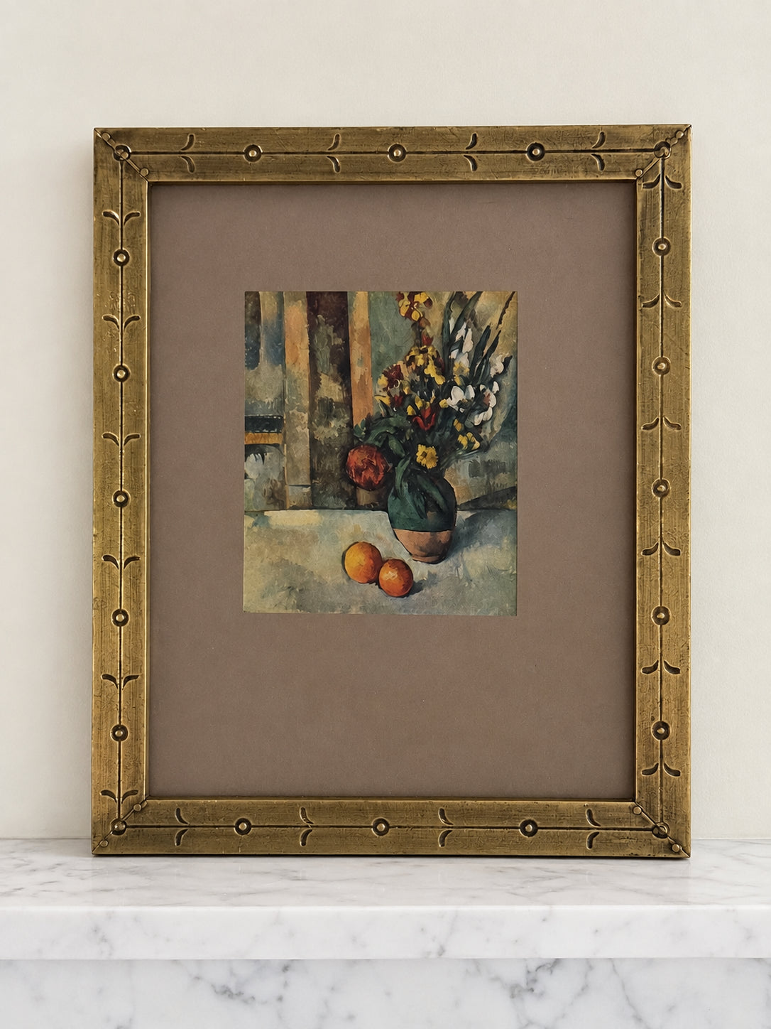 Cezanne reproduction of flowers in a green vase with two oranges, in an ornate antique gold frame