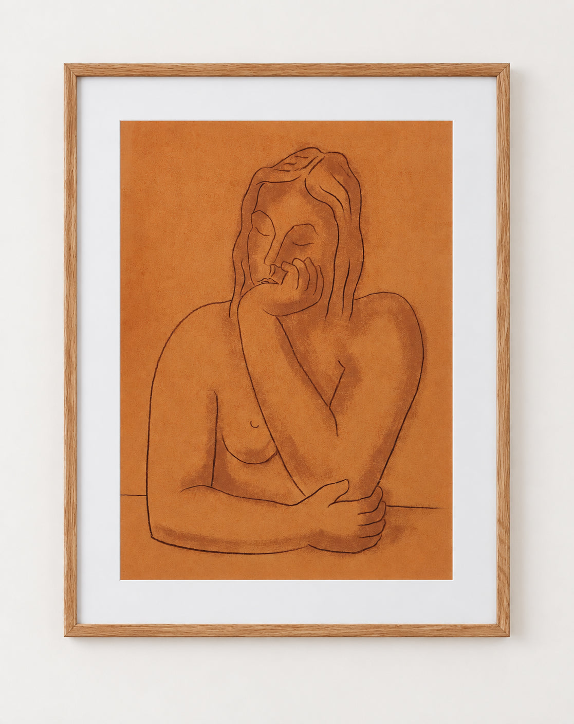Seated nude line study on an ochre ground, matted in a light oak frame
